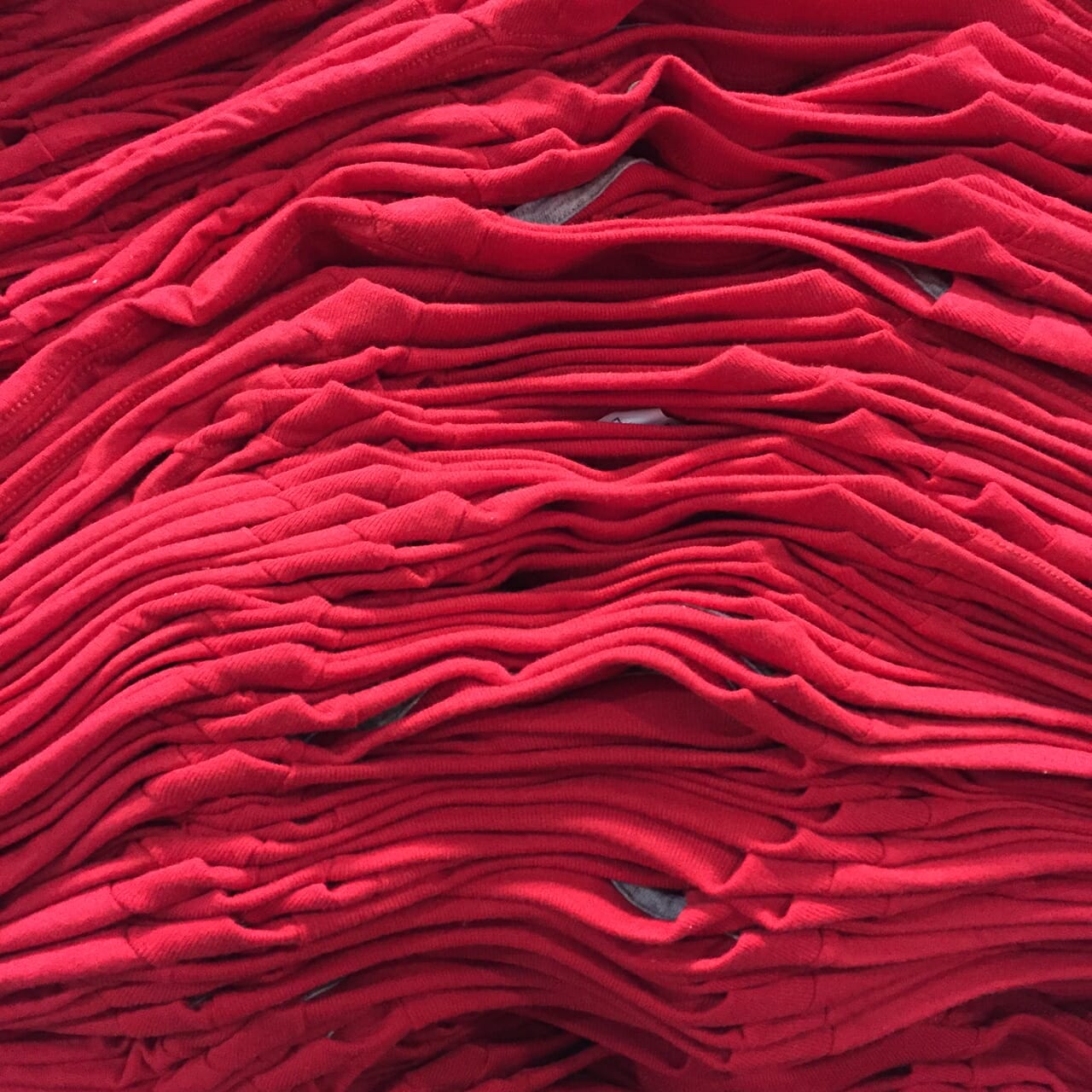 Stack of Red T-shirts - Marshall Atkinson