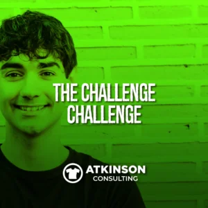 Confident young man standing in front of a brick wall wearing a black tshirt