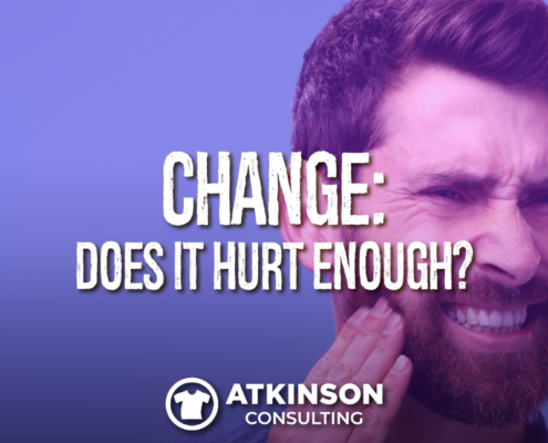 Bearded Man Wincing in Pain