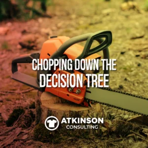 Chainsaw resting on a tree stump