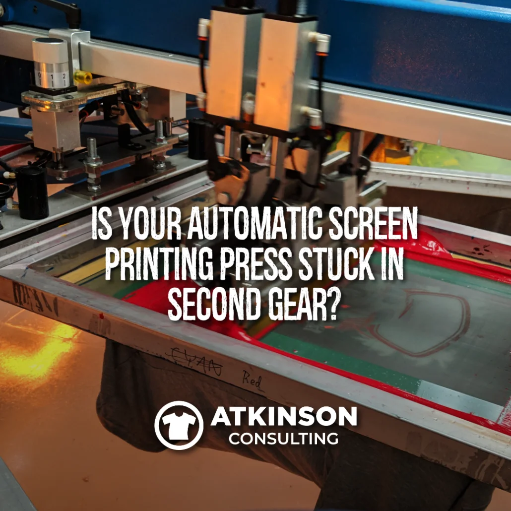 Automatic screen printing press with a screen, squeegee, and floodbar